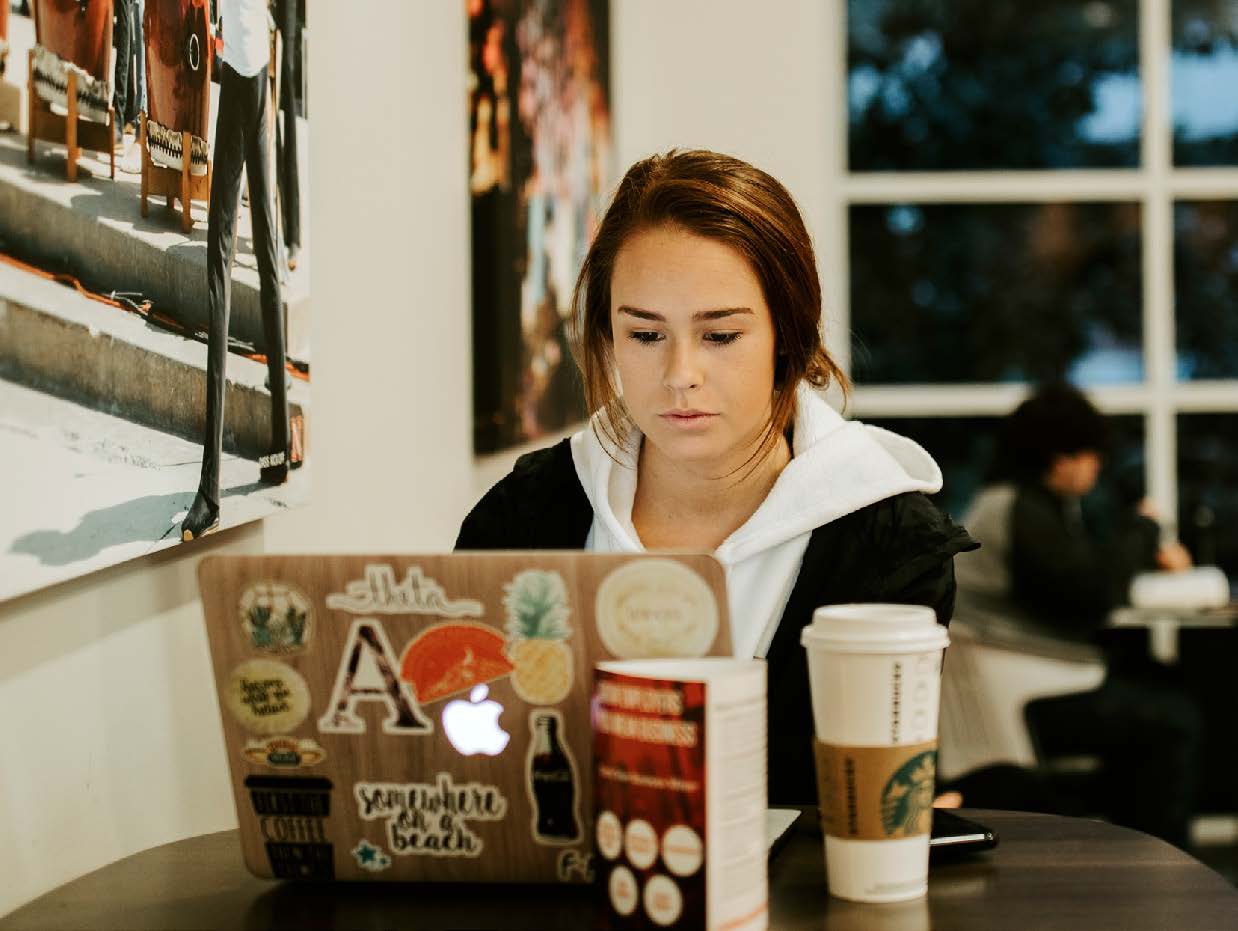 A girl working on her laptop.