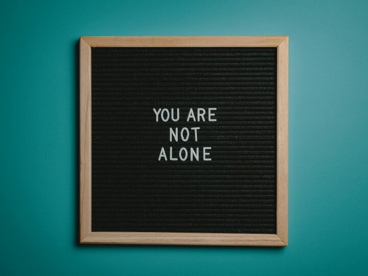 You are not alone letters on board