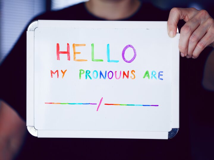 Whiteboard with Hello my pronouns are